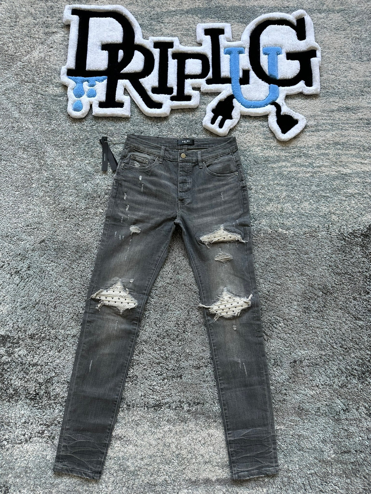 AMIRI JEANS MX1 GREY PLAYBOY